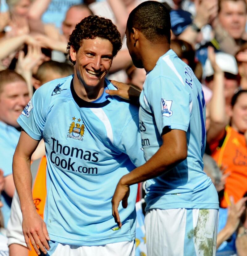 Manchester City's Brazilian forward Elano (L) The creative Brazilian proved a hit at City but the 2008-09 campaign was his second and last at the club before he was sold to Galatasaray. Later had two more stints with first club Santos and also played in India before retiring in 2016. AFP PHOTO 