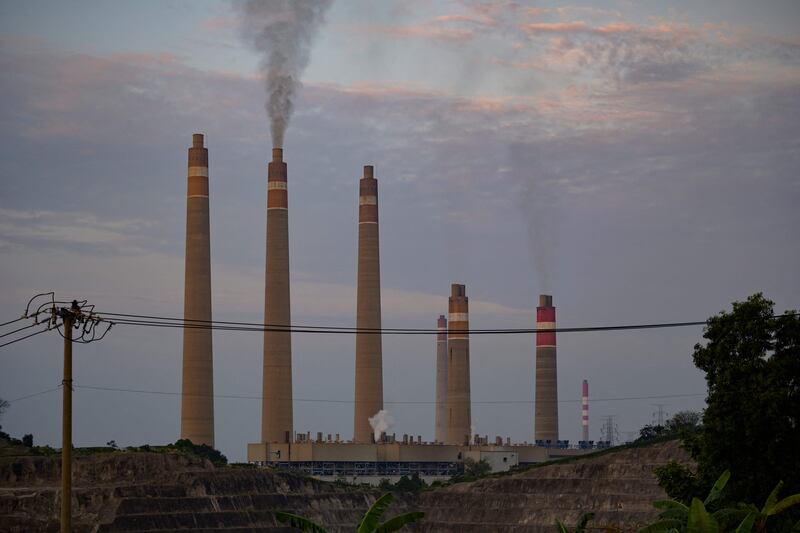 Smoke rising from chimneys at the Suralaya coal power plant in Cilegon. Should temperatures rise more than 3°C above pre-industrial levels the global economy is expected to shrink by 18 per cent. AFP