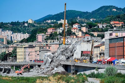 A view of the rubble of the partially collapsed Morandi highway bridge, in Genoa, Italy, Monday, Aug. 27,  2018. Italyâ€™s transport minister Danilo Toninelli says the nationâ€™s entire infrastructure urgently needs both regular and extraordinary maintenance to avoid another Genoa-type tragedy, which collapsed Aug. 14, leaving 43 dead.  (Simone Arveda/ANSA via AP)