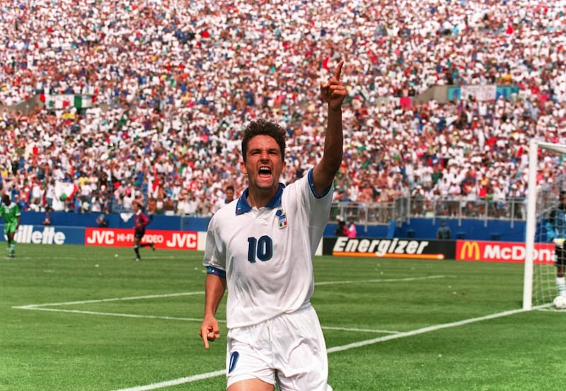 5 JULY 1994:  ROBERTO BAGGIO OF ITALY CELEBRATES AFTER SCORING ON A PENALTY KICK DURING THEIR SECOND ROUND MATCH AGAINAST NIGERIA DURING THE 1994 WORLD CUP AT FOXBORO STADIUM IN MASSACHUSETTS.  ITALY WON THE GAME, 2-1, IN EXTRA TIME. Mandatory Credit: Ric