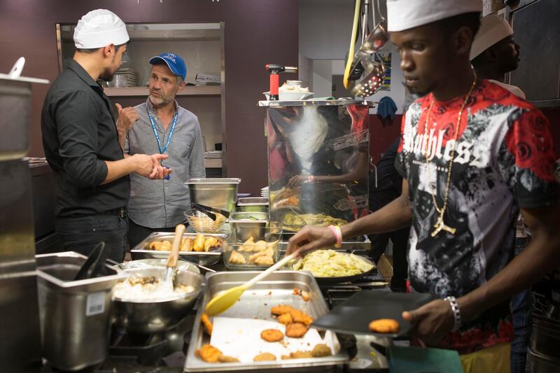  UNHCR Goodwill Ambassador Khaled Hosseini meeting and cooking with the refugee founders and refugee chefs at the Orient Experience restaurant in Catania Sicily. ; UNHCR Goodwill Ambassador Khaled Hosseini meets refugees on the Italian island of Sicily. UNHCR/Andy Hall