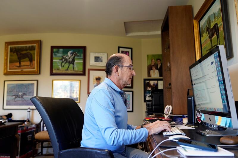 Richard Shapiro at his home in Hidden Hills, California. Mr Shapiro was one of the victims of the Bernard Madoff Ponzi scheme. When the scam was revealed in 2008, Mr Shapiro had retired, but went back to work and managed to save his home. His marriage ended about two years later and he believes the stress over the Madoff debacle contributed to its end. AP