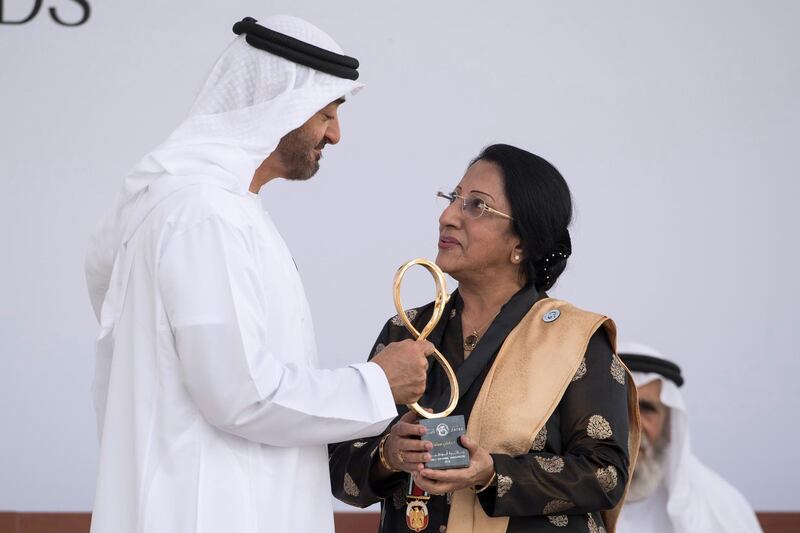 ABU DHABI, UNITED ARAB EMIRATES -  March 12, 2018: HH Sheikh Mohamed bin Zayed Al Nahyan, Crown Prince of Abu Dhabi and Deputy Supreme Commander of the UAE Armed Forces (L), presents an Abu Dhabi Award to Dr Jayanti Maitra (R), during the awards ceremony at the Sea Palace.
( Ryan Carter for the Crown Prince Court - Abu Dhabi )
---