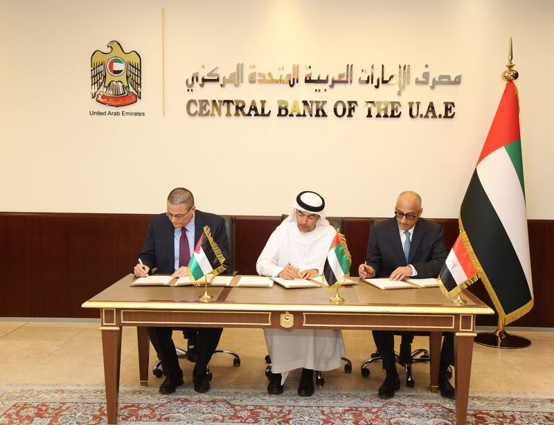 Central bank governors from the UAE, Egypt and Jordan sign preliminary agreements to boost collaboration. Photo: Central Bank of the UAE