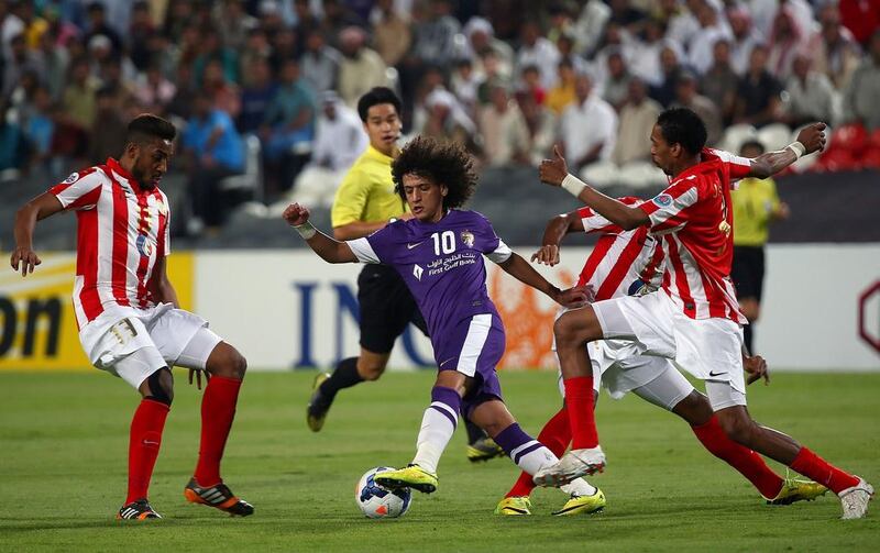 MIDFIELD - OMAR ABDULRAHMAN (Al Ain): This season, we have seen some excellent playmakers in action, such as Al Jazira’s Abdelaziz Barrada, Ajman’s Simon Feindouno, Luis Jiminez for Al Ahli, Al Wahda’s Damian Diaz and Kim Jung-woo at Sharjah. But with Abdulrahman available, there is really no need to look at the foreign contingent. Injuries did restrict his appearance in the AGL to 17 matches, but his performance against Al Jazira in the Asian Champions League last week showed why some of Europe’s top clubs are keeping tabs on him. Marwan Naamani / AFP