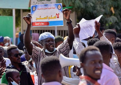 Demonstrators took to the streets on Thursday to support the civilian members of Sudan's government. AFP. 