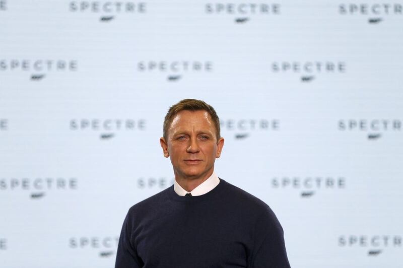 Actor Daniel Craig poses on stage during an event to mark the start of production for the new James Bond film Spectre, at Pinewood Studios in Iver Heath, southern England on December 4, 2014. Stefan Wermuth / Reuters 