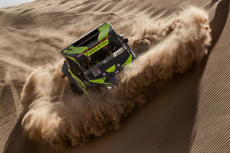 Driver Denis Berezovskiy and co-driver Adrian Torlaschi race their Can-Am during Stage 8 of the Dakar Rally in Saudi Arabia, on Monday, January 13. AP