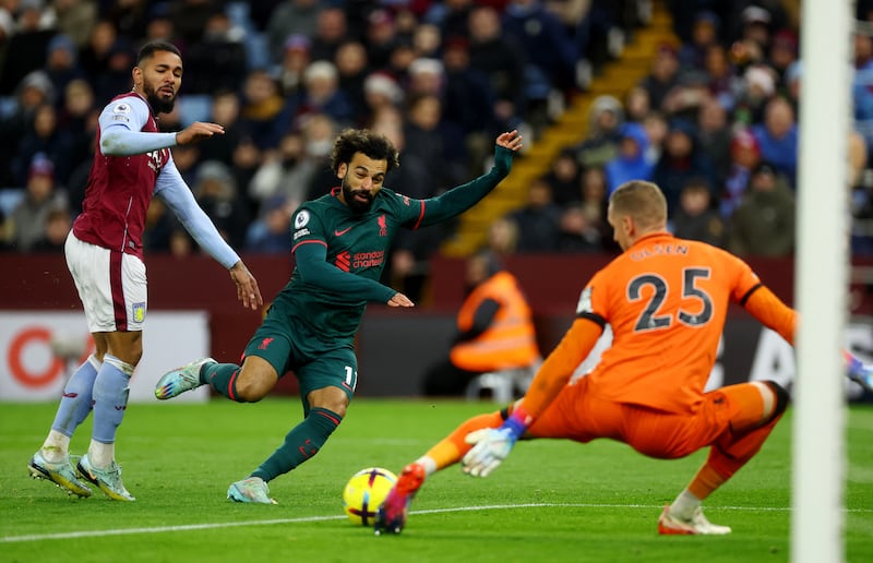 Aston Villa's Robin Olsen saves blocks the effort by Liverpool's Mohamed Salah in their clash at Villa Park in Birmingham on Monday. Reuters