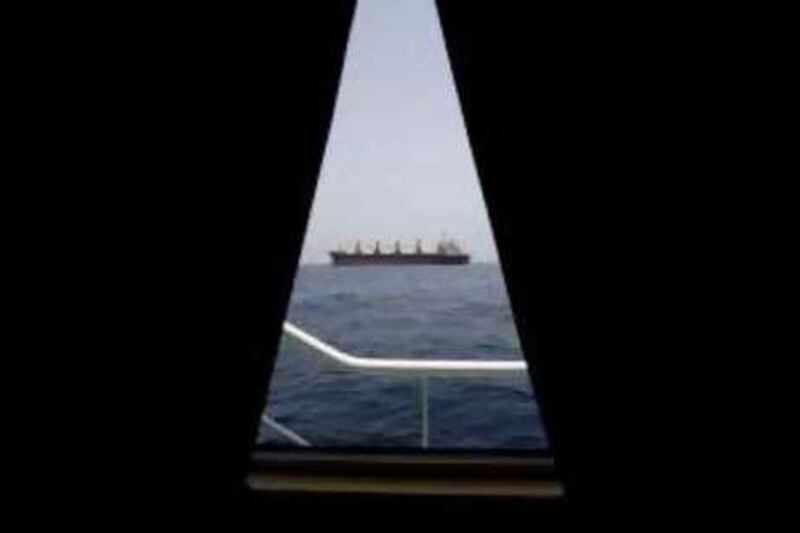 United Arab Emirates - Fujairah - Jul 01 - 2008 : A boat is seen through the window of the " Fly Angel " ship in the Fujairah coat. ( Jaime Puebla / The National ) *** Local Caption ***  JP104 - FLY ANGEL.jpg