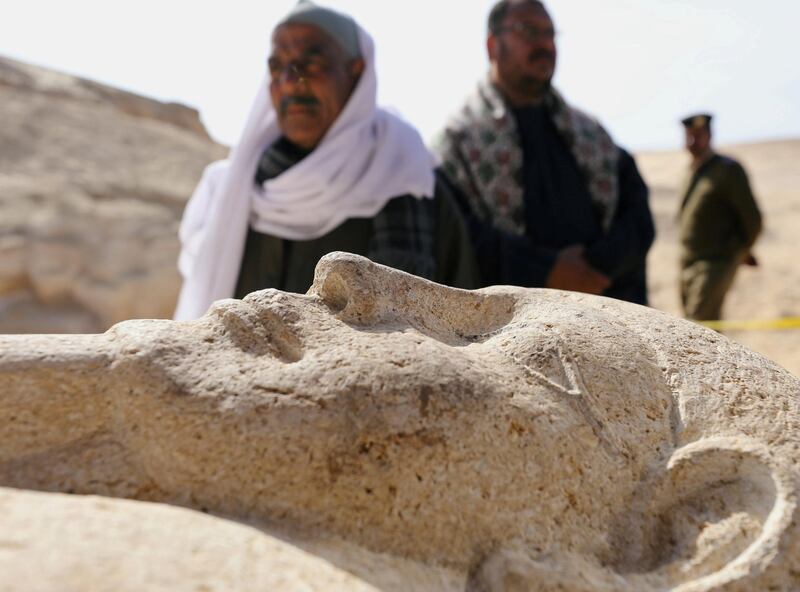 Men secure a stone sarcophagus discovered in an ancient burial site in Minya, Egypt. Mohamed Abd El Ghany / Reuters