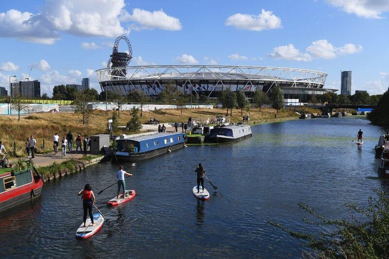 A general view of the London Stadium and surrounding area as a paddle boarders move along the river prior to the Premier League match between West Ham United and Southampton. Shaun Botterill / Getty Images