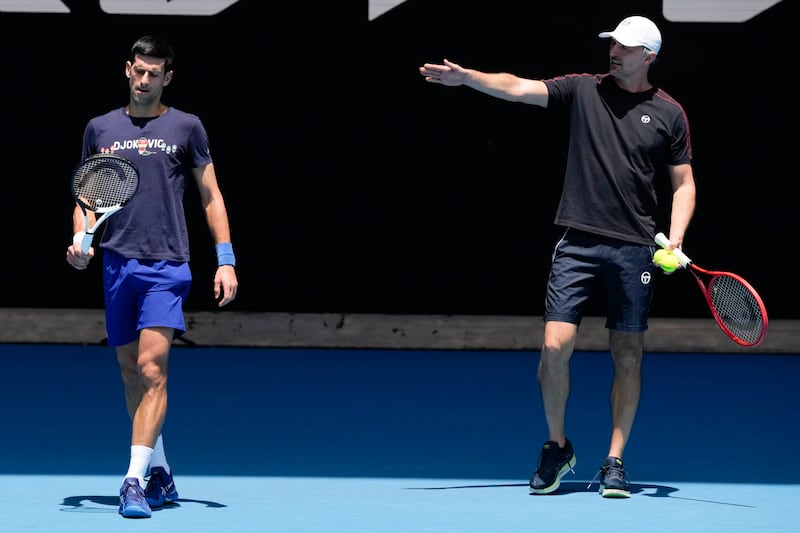Novak Djokovic, left, listens to his coach Goran Ivanisevic. AP Photo