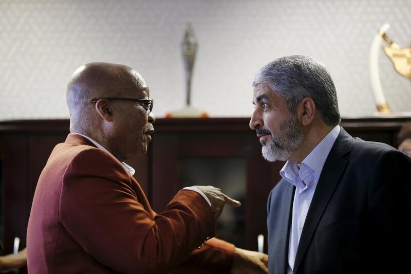 Hamas leader Khaled Meshaal speaks to South African president Jacob Zuma ahead of a media briefing at the headquarters of South Africa's ruling African National Congress (ANC) in Johannesburg. Siphiwe Sibeko / Reuters