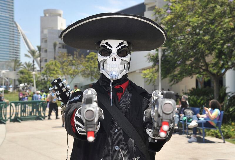 Angel Castillo, of Temecula, California, is dressed as Reaper from "Overwatch" mariachi edition. AP Photo