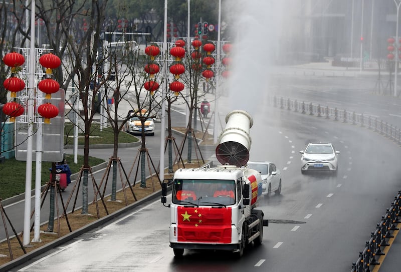 Workers operate a vehicle to carry out disinfection in Jianghan district, following an outbreak of the novel coronavirus in Wuhan, Hubei province, China. REUTERS