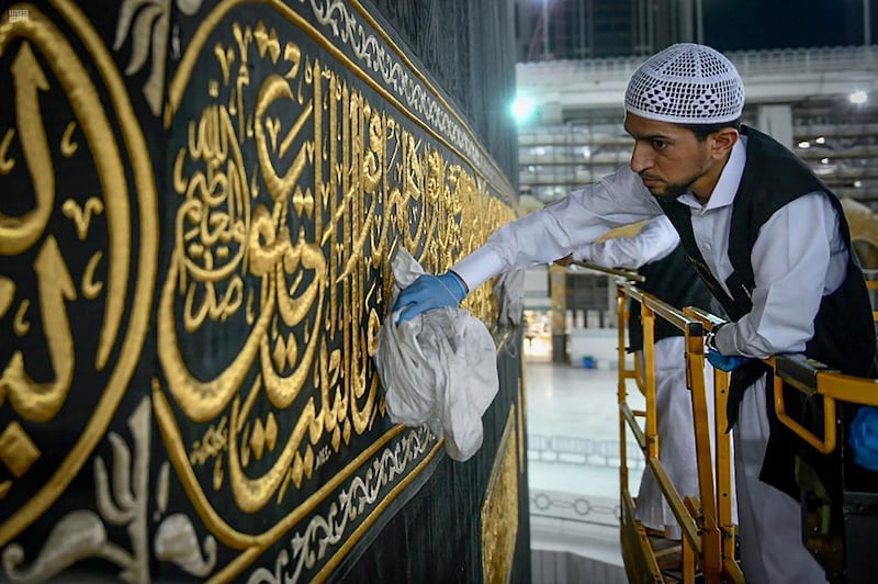 A worker cleans and sterilises the Kaaba in Makkah, Saudi Arabia. Reuters