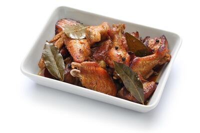 EWY676 chicken and pork adobo, filipino food isolated on white background. Kyoko Uchida / Alamy Stock Photo
