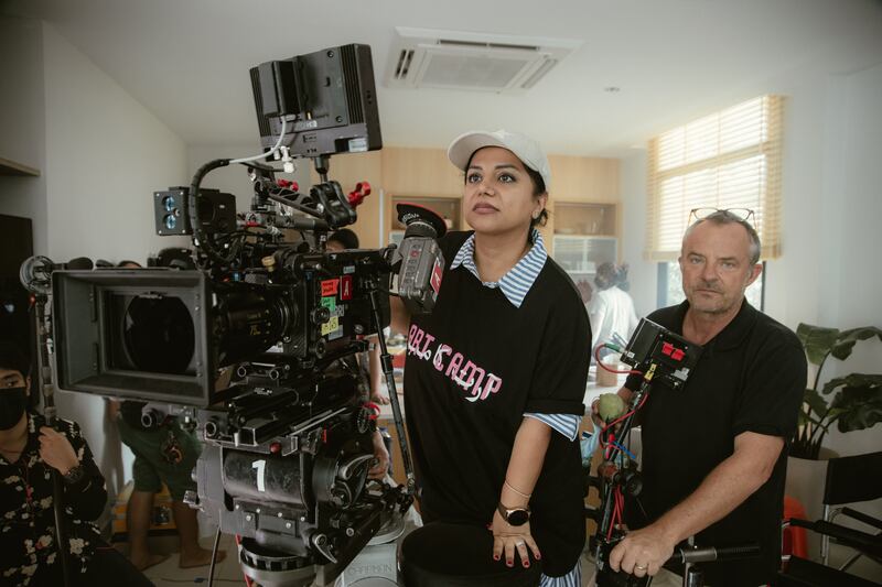 Nayla Al Khaja with the director of photography Mik Allen on the set of the film Three in Bangkok. Photo: Nayla Al Khaja Films