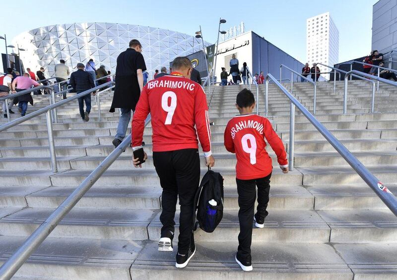 Manchester United fans make the walk to the Friends Arena for the Europa League final. Peter Powell / EPA