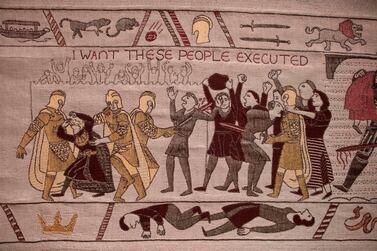 Embroidered scenes on the tapestry depicting the hit television series Game of Thrones are on show at the Ulster Museum in Belfast on July 5, 2019. Like the Bayeux Tapestry, the Game of Thrones Tapestry is woven of fine linen and hand-embroidered, with decorative borders and a central pictorial narrative. It will reach 90 metres by the end of the final season of the show. / AFP / Paul Faith