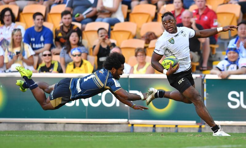 Kris Kuridrani of Fiji gets past Henry Speight of the Brumbies to score a try during the Global Rugby Tens match between Fiji and Australia's ACT Brumbies in Brisbane. Dave Hunt / EPA