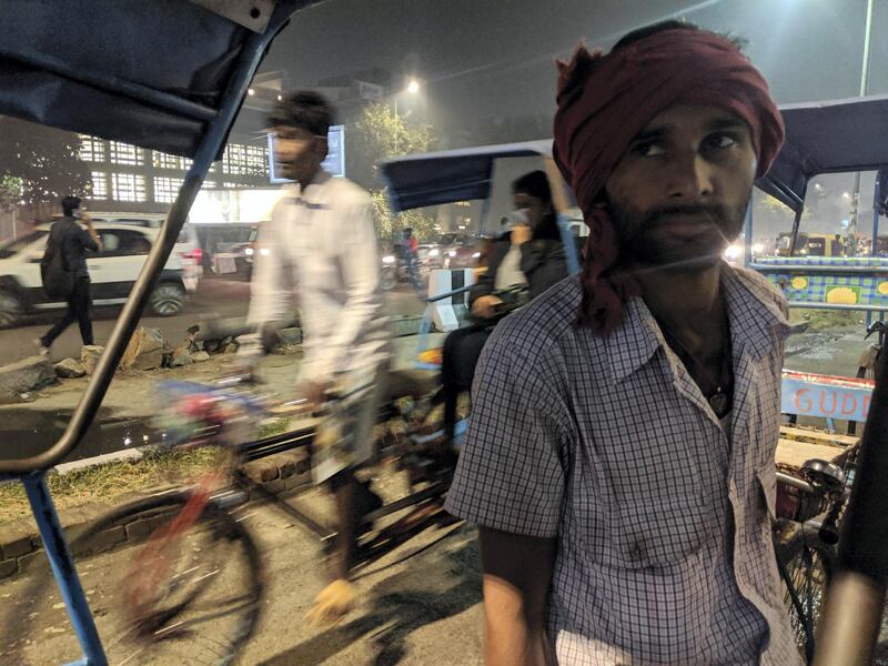 Santosh Yadav, waiting for passengers outside a metro station in New Delhi. Taniya Dutta for The National 