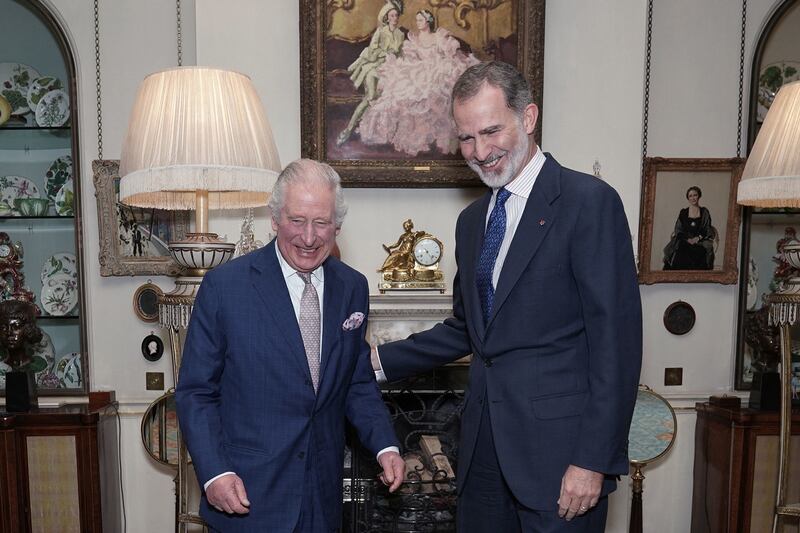 The monarch meets Spain's King Felipe VI at Clarence House in London. AFP