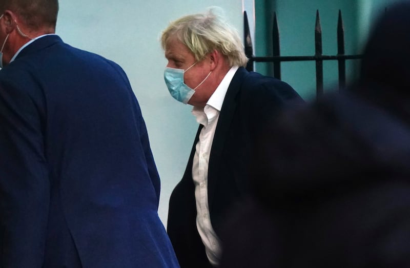 Boris Johnson has come under enormous pressure amid a scandal over a lockdown-breaking Christmas party at Downing Street. He is pictured arriving at University College Hospital in London on Thursday where his wife Carrie gave birth to their second child. AP