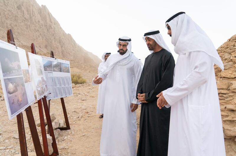 AL AIN, UNITED ARAB EMIRATES - January 19, 2019: HH Sheikh Mohamed bin Zayed Al Nahyan, Crown Prince of Abu Dhabi and Deputy Supreme Commander of the UAE Armed Forces (2nd R) inspects Jebel Hafeet tombs. Seen with HE Mohamed Khalifa Al Mubarak, Chairman of the Department of Culture and Tourism and Abu Dhabi Executive Council Member (3rd R) and HE Saif Ghobash, Director General of Abu Dhabi Tourism and Culture Authority (R).

( Rashed Al Mansoori / Ministry of Presidential Affairs )
---