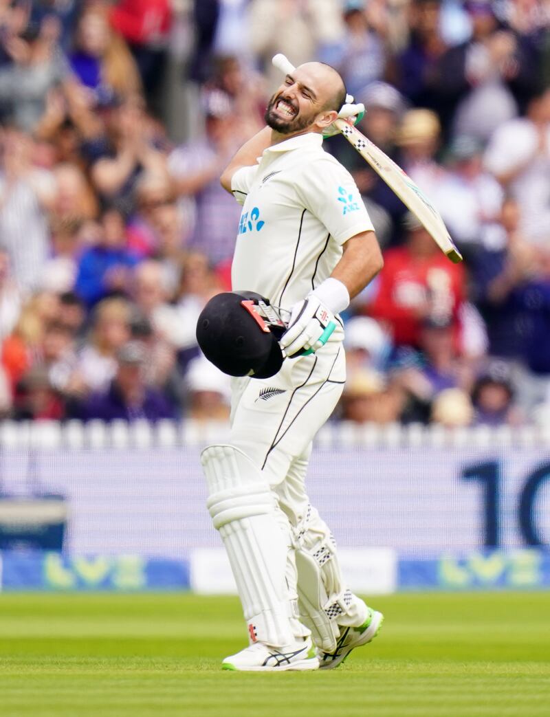 New Zealand's Daryl Mitchell celebrates reaching his century. PA