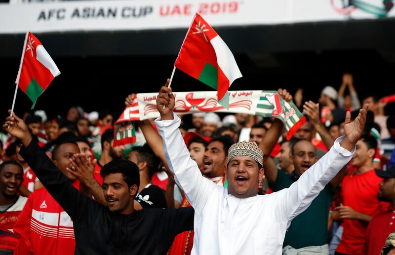 Oman supporters cheer prior to the match. AP Photo