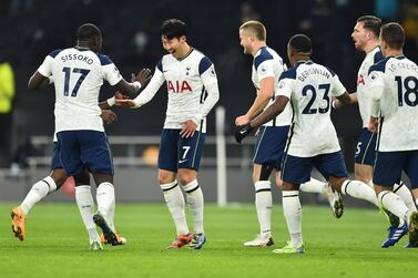 epa08866823 Son Heung-min (C) of Tottenham celebrates with teammates after scoring the opening goal during the English Premier League soccer match between Tottenham Hotspur and Arsenal FC in London, Britain, 06 December 2020. EPA/Glyn Kirk / POOL EDITORIAL USE ONLY. No use with unauthorized audio, video, data, fixture lists, club/league logos or 'live' services. Online in-match use limited to 120 images, no video emulation. No use in betting, games or single club/league/player publications.