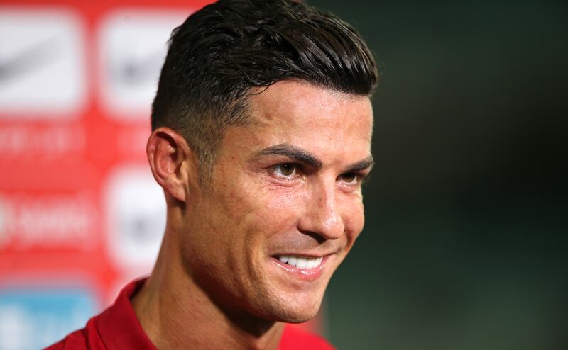 Cristiano Ronaldo is interviewed after breaking the record. AP