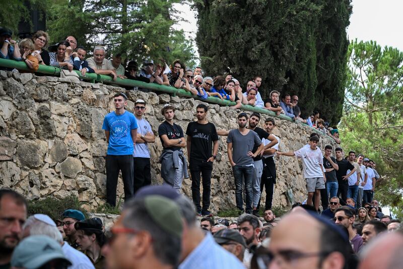 Family and friends mourn Valentin Ghnassia, 23, who was killed in a battle with Palestinian militants at Kibbutz Beeri near the Israeli border with the Gaza Strip. Getty Images