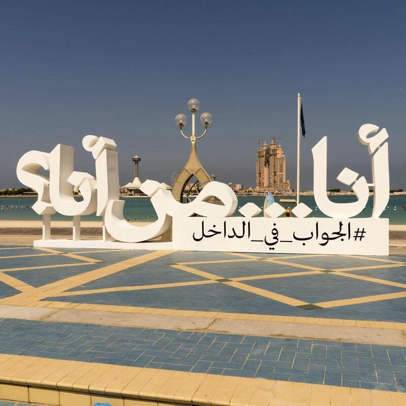 The Arabic version of the Why Are You, You? sculpture with its associated #TheAnswerInside hashtag on Abu Dhabi's Corniche