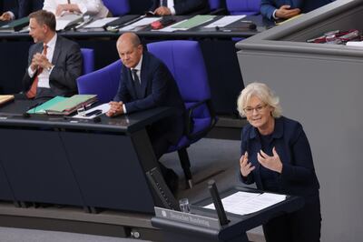 Chancellor Olaf Scholz, centre, will appoint a successor to Ms Lambrecht from Social Democratic ranks. Getty 