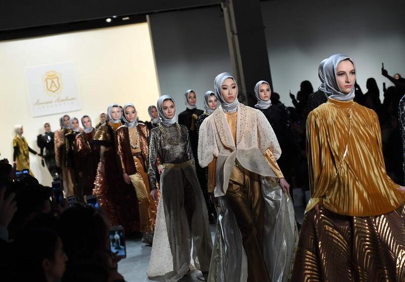 Models walk the runway for the Anniesa Hasibuan show during New York Fashion Week on February 14, 2017, in New York City.  AFP 

