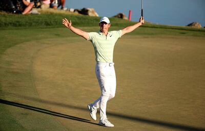 Rory McIlroy celebrates after sinking a birdie putt on the 18th green to win the Arnold Palmer Invitational at Bay Hill Club & Lodge in Orlando on Sunday, March 18, 2018. (Stephen M. Dowell /Orlando Sentinel via AP)