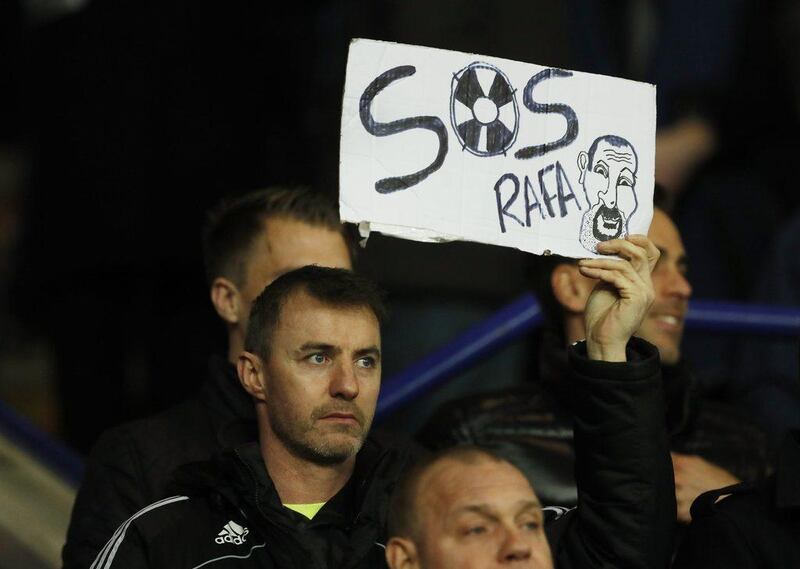 Newcastle United fan holds up a sign for manager Rafa Benitez. Action Images via Reuters / John Sibley