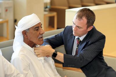 Abu Dhabi, United Arab Emirates - November 11, 2019:  Saeed Sulaiman Al Jaeedi a patient who spoke for the first time in ten years after losing his voice pictured with Dr Colin Maciver. Monday the 11th of November 2019. Abu Dhabi. Chris Whiteoak / The National