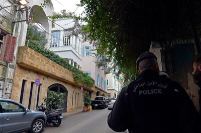 epa08095758 A Lebanese policeman stands guards in front of a house identified by court documents as belonging to former Nissan Motor Co. and Renault SA chairman Carlos Ghosn at the Ashrafieh area in Beirut, Lebanon, 31 December 2019. According to media reports, former Nissan chairman Carlos Ghosn, who was on bail and under surveillance in Tokyo awaiting trial on financial misconduct charges, has arrived in Beirut after he flew in on a private jet via Turkey on 30 December 2019.  EPA/WAEL HAMZEH