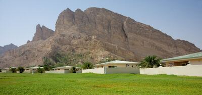 Green Mubazzarah has rolling grassy hillsides and natural hot springs. Photo: Danat Hotels