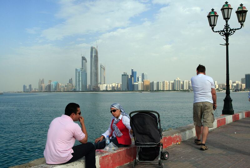 ABU DHABI - 06NOV2011 - People enjoy the good weather with family and friends at the flag point to celebrate the first day of Eid al Ahda yesterday in Abu Dhabi. Ravindranath K / The National