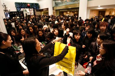 Shoppers crowd Selfridges in London as the store opens it doors on the first day of its winter sale on Boxing Day in 2009. AFP