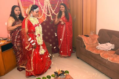 Kshama Bindu performs rituals during her solo wedding ceremony at her home in Vadodara. AP