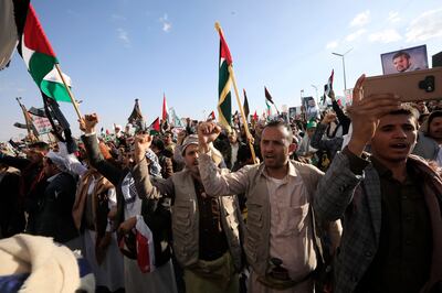People shout slogans during a protest against the US-led maritime operation in the Red Sea in Sanaa, Yemen. EPA