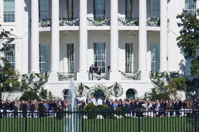 Ms Biden's bridesmaids included her sister Roberta, also known as Maisy, and Katherine Neal. Reuters