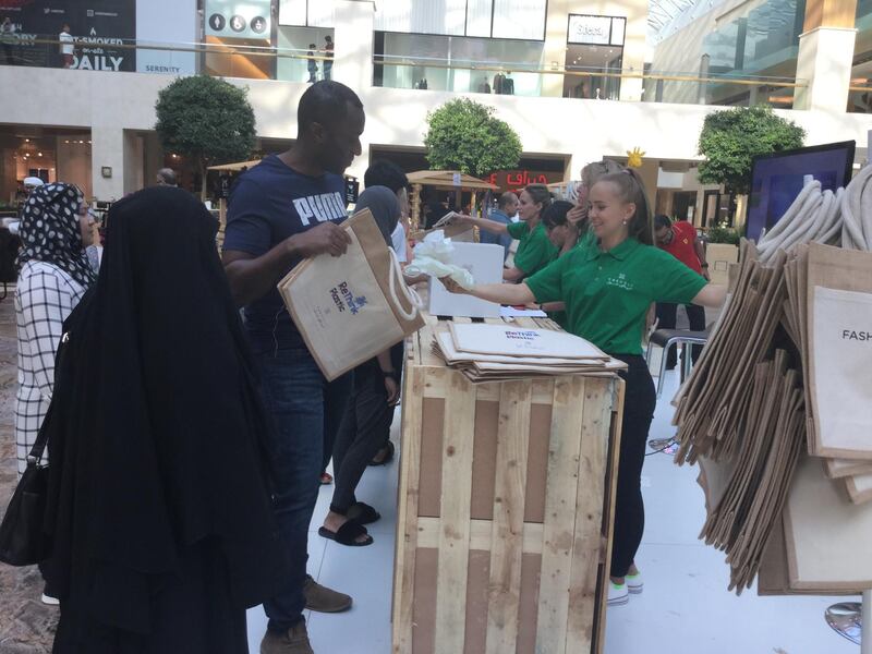 Yas Mall is handing thousands of plastic bags to help reduce plastic waste. 