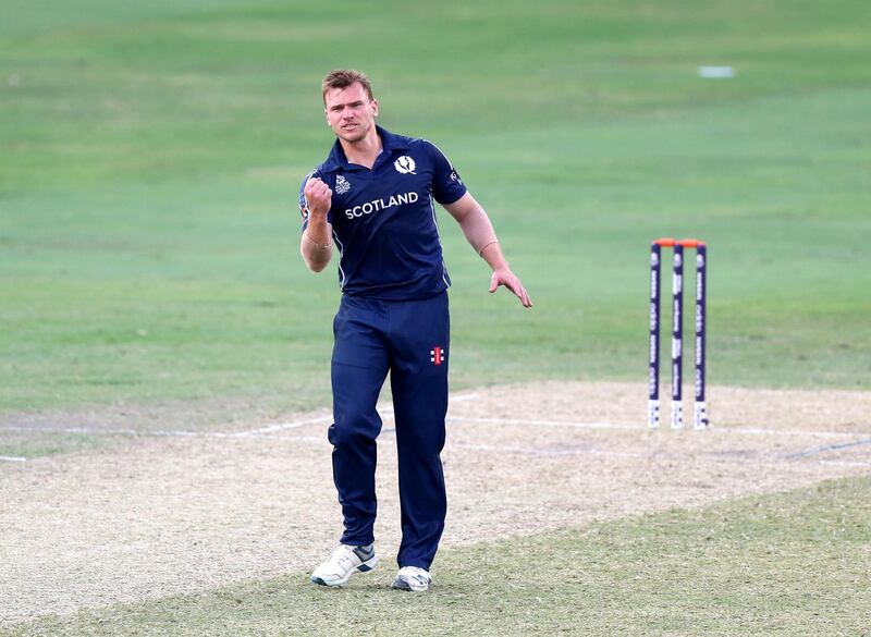 Dubai, United Arab Emirates - October 30, 2019: Scotland's Richie Berrington takes the wicket of UAE's Waheed Ahmed during the game between the UAE and Scotland in the World Cup Qualifier in the Dubai International Cricket Stadium. Wednesday the 30th of October 2019. Sports City, Dubai. Chris Whiteoak / The National